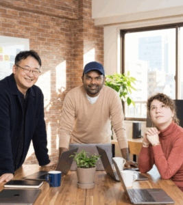 Sparkli team posing in front of camera