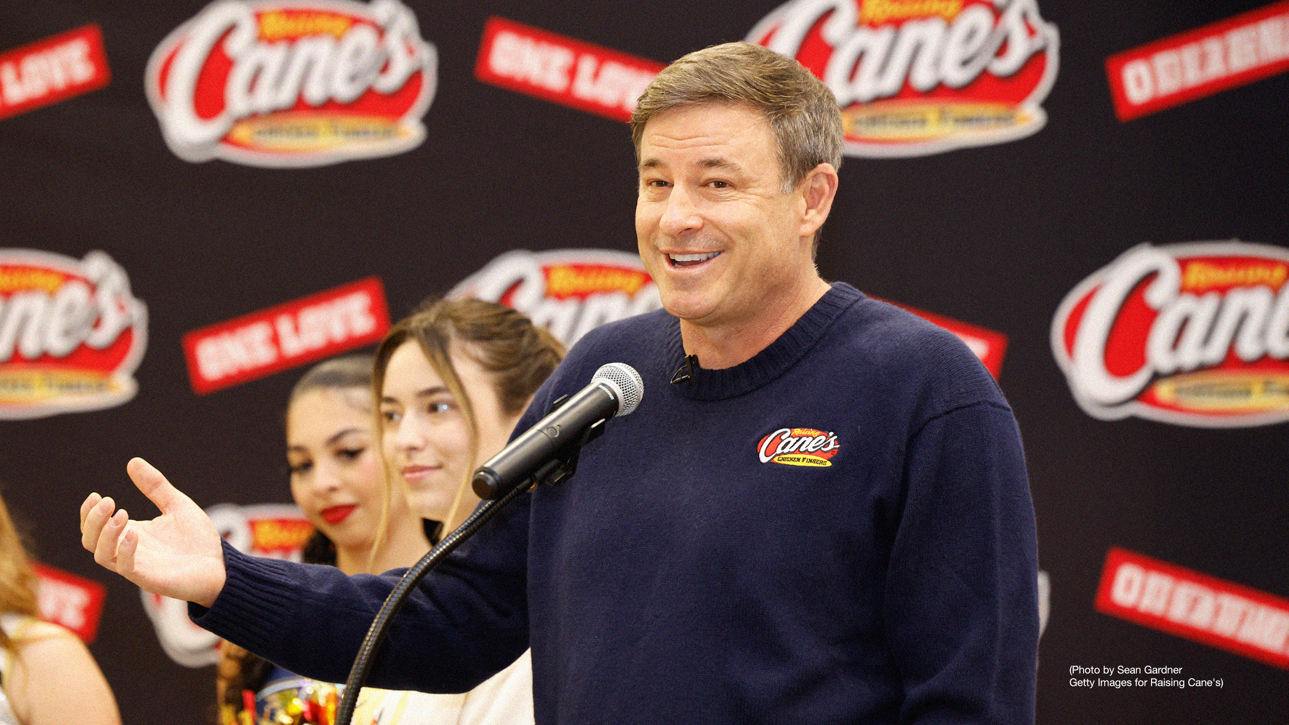 Raising Cane's Owner & Founder Todd Graves joins New Orleans Saints Owner Gayle Benson in Baton Rouge for Bike Donation to The YMCA Of The Capital Area on December 17, 2025 in Baton Rouge, Louisiana. (Photo by Sean Gardner/Getty Images for Raising Cane's)